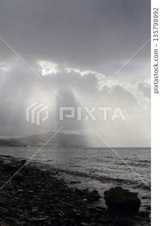 Beautiful shot of sunbeam over the aegean sea Beautiful shot of sunbeam over the aegean sea 135798992