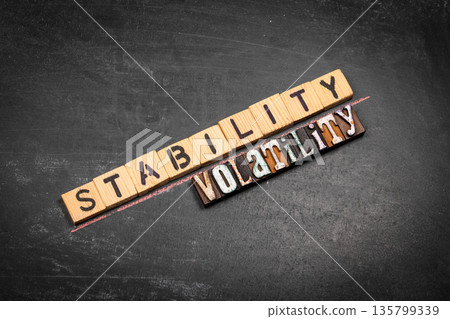 STABILITY Versus Volatility Financial Risk Comparison Using Wooden Letter Blocks STABILITY Versus Volatility Financial Risk Comparison Using Wooden Letter Blocks 135799339