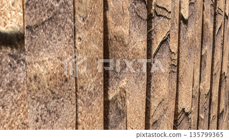 Natural Brown Stone Wall Vertical Panel Texture Background 3d render. Natural Brown Stone Wall Vertical Panel Texture Background 3d render. 135799365