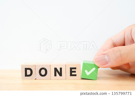 Stock photo of a white background showing completion with a check mark and DONE. 135799771