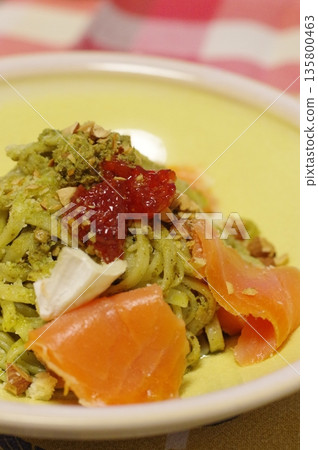 A luxurious pasta dish with salmon, Camembert cheese and salmon roe in a pesto sauce A luxurious pasta dish with salmon, Camembert cheese and salmon roe in a pesto sauce 135800463