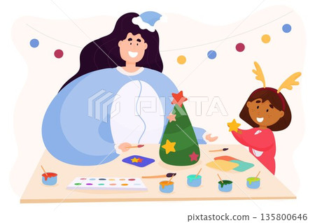 Mom and daughter doing Christmas crafts 135800646