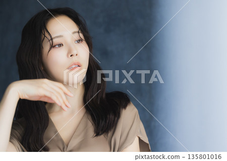 A woman by the window A woman by the window 135801016