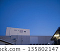 Minimalist cityscape with blue sky and white buildings 135802147