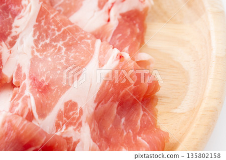 Close-up of thinly sliced raw pork shoulder 135802158