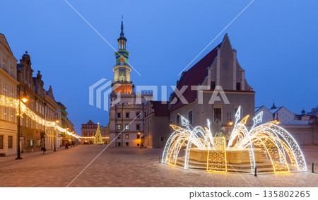 Poznan Old Market Square with illuminated fountain and colorful buildings 135802265