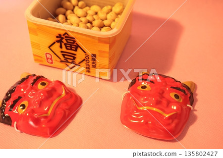 Setsubun demon mask and lucky charms in a wooden box 135802427