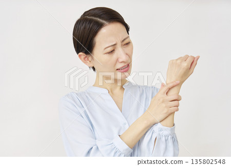 Woman in her 40s, rash, white background 135802548