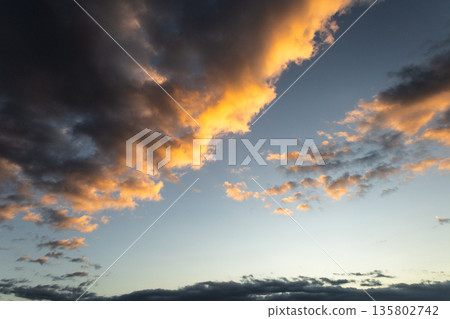 Cloudy twilight winter sky Cloudy twilight winter sky 135802742