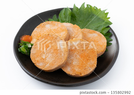 Monkfish liver served on a plate on a white background 135802992