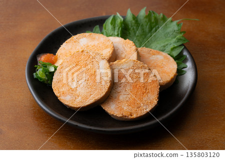 Delicious-looking monkfish liver served on a plate 135803120