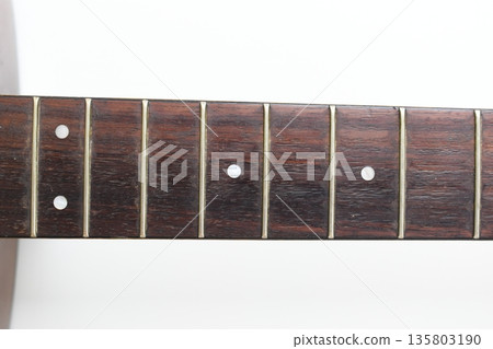 part of brown wood acoustic guitar isolated on white background 135803190