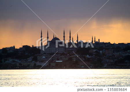 Sillhouette of Istanbul at sunset. Ramadan time with the muslim city istanbul silhouette Sillhouette of Istanbul at sunset. Ramadan time with the muslim city istanbul silhouette 135803684