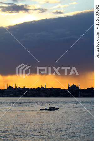 Sillhouette of Istanbul at sunset. Ramadan time with the muslim city istanbul silhouette Sillhouette of Istanbul at sunset. Ramadan time with the muslim city istanbul silhouette 135803692