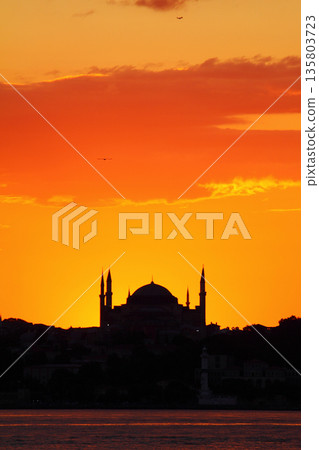 Sillhouette of Istanbul at sunset. Ramadan time with the muslim city istanbul silhouette Sillhouette of Istanbul at sunset. Ramadan time with the muslim city istanbul silhouette 135803723