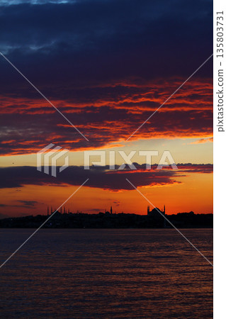 Sillhouette of Istanbul at sunset.  Ramadan time with the muslim city istanbul silhouette 135803731
