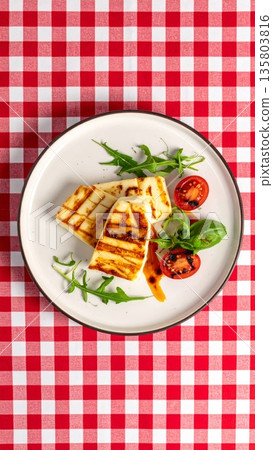 Grilled Halloumi on Gingham Tablecloth Grilled Halloumi on Gingham Tablecloth 135803816