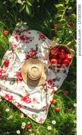 Floral Picnic Blanket with Wicker Basket Apples and Straw Hat Floral Picnic Blanket with Wicker Basket Apples and Straw Hat 135803886