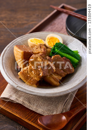 Braised pork belly with boiled egg and komatsuna 135804419