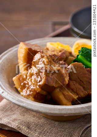 Braised pork belly with boiled egg and komatsuna 135804421