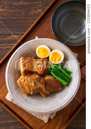 Braised pork belly with boiled egg and komatsuna Braised pork belly with boiled egg and komatsuna 135804423
