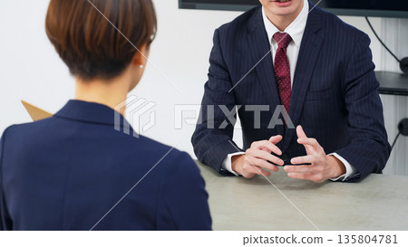 Group of business people meeting in an office 135804781