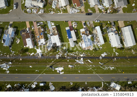 Badly damaged mobile homes after hurricane Ian in Florida residential area. Consequences of natural disaster 135804913