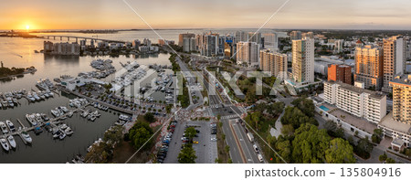 Sarasota, Florida city downtown at sunset with expensive bayfront high-rise buildings. Urban travel destination in the USA 135804916