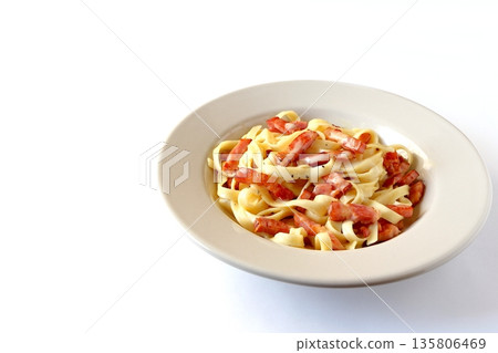 Tagliatelle carbonara with plenty of bacon Tagliatelle carbonara with plenty of bacon 135806469