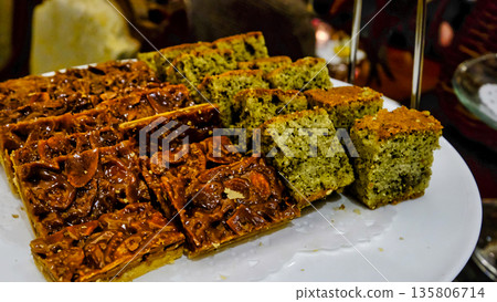 Matcha cake on a plate Matcha cake on a plate 135806714