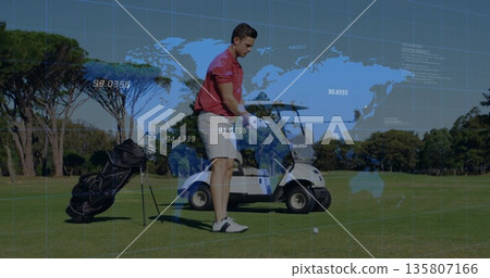 Male golfer wearing red polo addressing ball on fairway, with golf club and digital overlay Male golfer wearing red polo addressing ball on fairway, with golf club and digital overlay 135807166