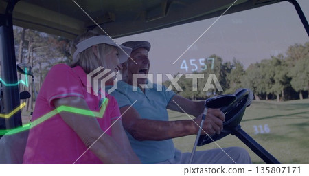Laughing couple in pink blue polo shirts driving golf cart along fairway, with trees, data overlay Laughing couple in pink blue polo shirts driving golf cart along fairway, with trees, data overlay 135807171