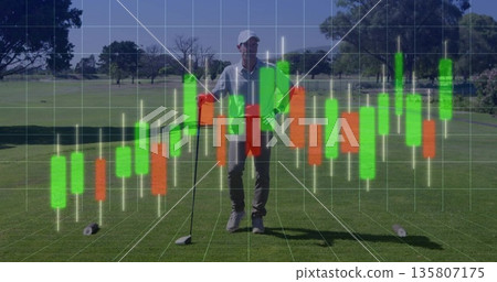 Standing man wearing golf wear gripping driver on tee box with golf ball, candlestick chart overlay Standing man wearing golf wear gripping driver on tee box with golf ball, candlestick chart overlay 135807175
