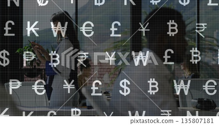 Discussing four suited coworkers examining finances by laptop in meeting room with currency overlay Discussing four suited coworkers examining finances by laptop in meeting room with currency overlay 135807181