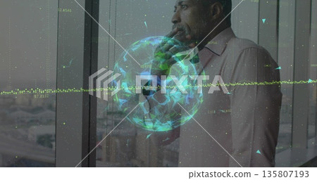 Businessman wearing pink shirt by office window surveying highways with 3D globe, copy space Businessman wearing pink shirt by office window surveying highways with 3D globe, copy space 135807193