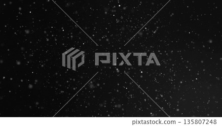 Drifting white snowflakes creating textured depth in nighttime outdoors, with glowing particles Drifting white snowflakes creating textured depth in nighttime outdoors, with glowing particles 135807248