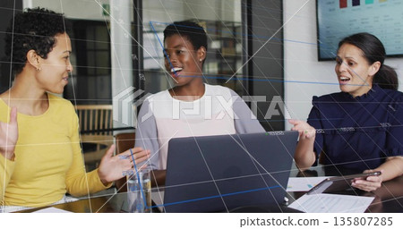 Discussing colleagues exchanging ideas in office with devices water glass, documents and bar charts Discussing colleagues exchanging ideas in office with devices water glass, documents and bar charts 135807285