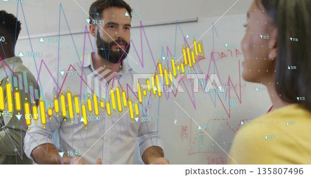 Colleagues in business attire analyzing data on office whiteboard, with digital bar and line graphs Colleagues in business attire analyzing data on office whiteboard, with digital bar and line graphs 135807496