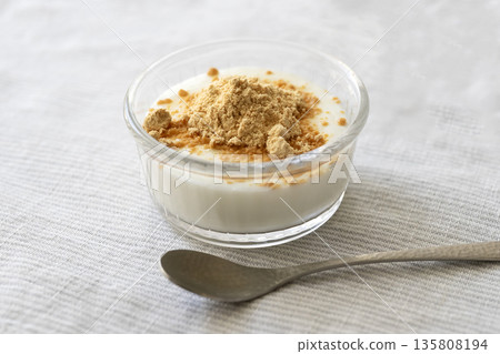 Yogurt with kinako and a spoon Yogurt with kinako and a spoon 135808194
