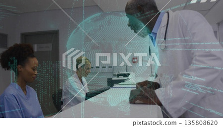 Leaning senior physician guiding nursing staff at clinic reception, with digital globe projection Leaning senior physician guiding nursing staff at clinic reception, with digital globe projection 135808620