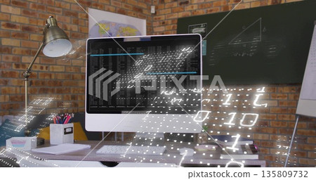 Displaying all-in-one monitor running code overlaying binary digits in brick office, keyboard mouse Displaying all-in-one monitor running code overlaying binary digits in brick office, keyboard mouse 135809732