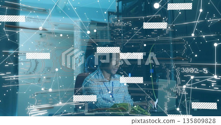 Connecting ethernet cables tech wearing checkered shirt monitoring network on laptop in server room Connecting ethernet cables tech wearing checkered shirt monitoring network on laptop in server room 135809828