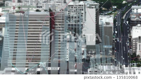 Overlaying financial data on downtown skyline, with bar charts, line graphs, and numeric labels 135810068
