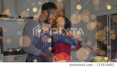 Cooking couple chopping vegetables at home kitchen counter, with smartphone and mixing bowl Cooking couple chopping vegetables at home kitchen counter, with smartphone and mixing bowl 135810682