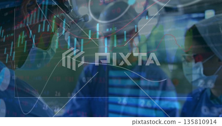 Standing surgeons wearing scrubs and masks in OR under overhead light, showing financial overlay Standing surgeons wearing scrubs and masks in OR under overhead light, showing financial overlay 135810914