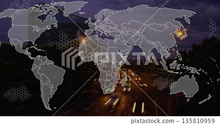 Showing world map overlay on dark highway, with glowing lamps, hexagons and blurred light trails Showing world map overlay on dark highway, with glowing lamps, hexagons and blurred light trails 135810959