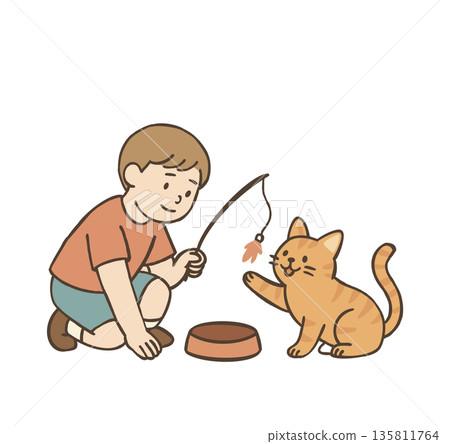 Boy playing with orange cat 135811764