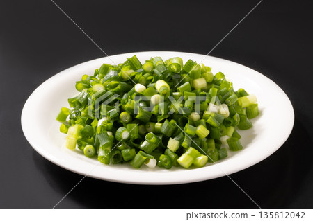 Cut green onions Cut green onions 135812042