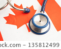 Canada flag with black stethoscope, Business and finance. 135812499