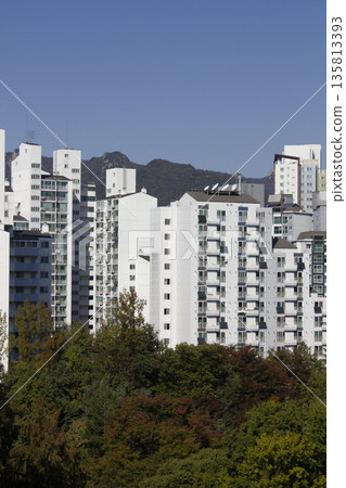 This is an apartment building in downtown Seoul. This is an apartment building in downtown Seoul. 135813393